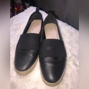 Calvin Klein black slip on sneakers